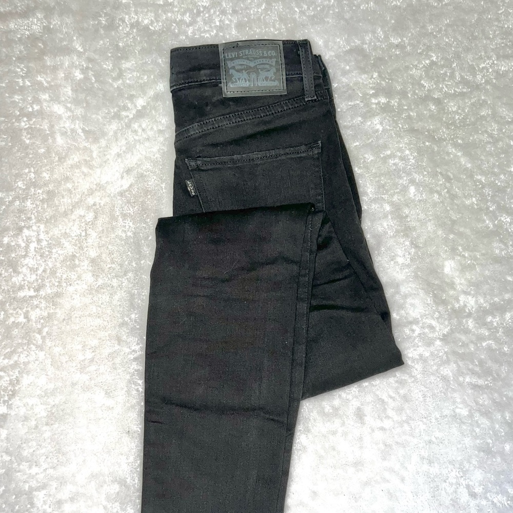 Skinny ripped black Levi’s